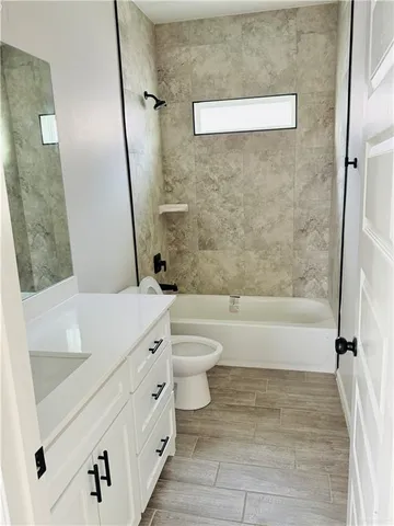 a utility room with washer and dryer