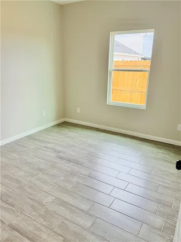 a view of a room with an empty room