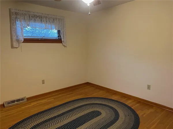 a bathroom with a sink and vanity