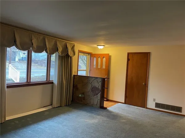 an empty room with windows