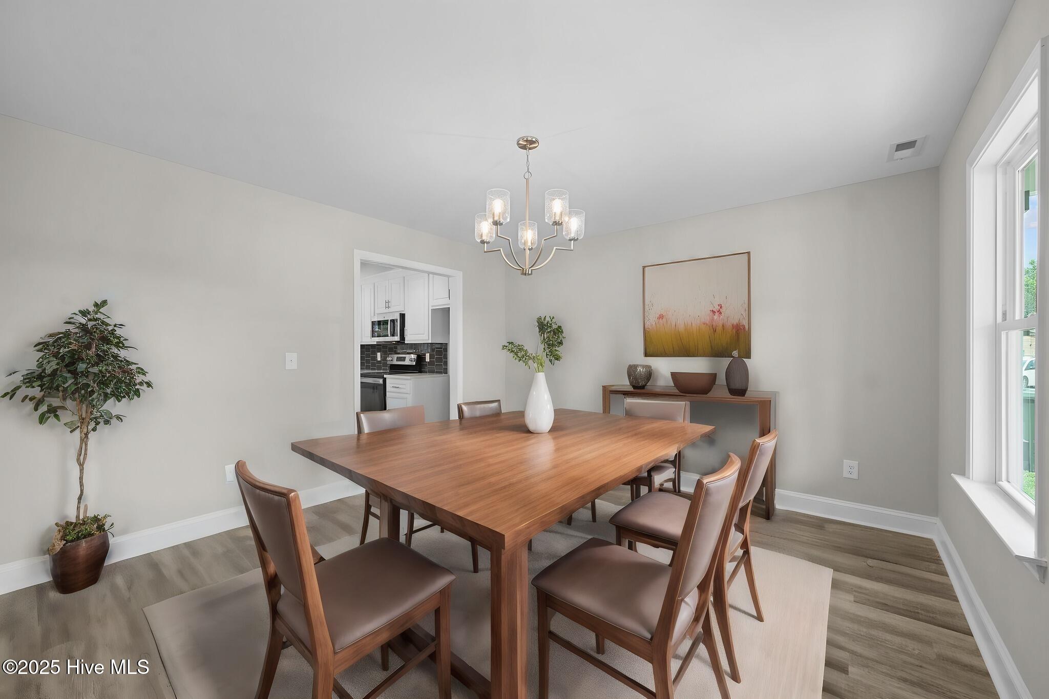 1011 Sunnybrook Road South Wilson, NC 27893 - Photo 8 of 36 1001 WSP dining room staged
