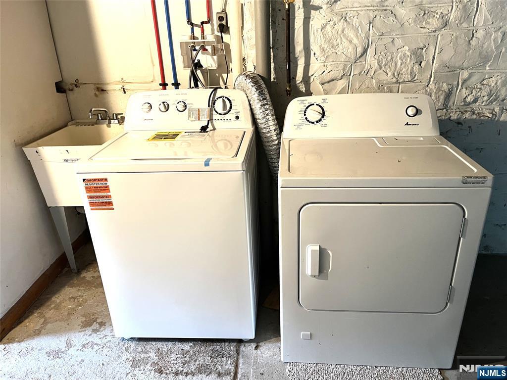 1156 High Mountain Road North Haledon, NJ 07508 - Photo 13 of 14 a utility room with dryer and washer
