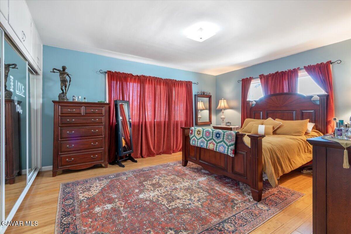 4817 Quartz Hill Road Quartz Hill, CA 93536 - Photo 13 of 41 a bed room with a bed and a dresser