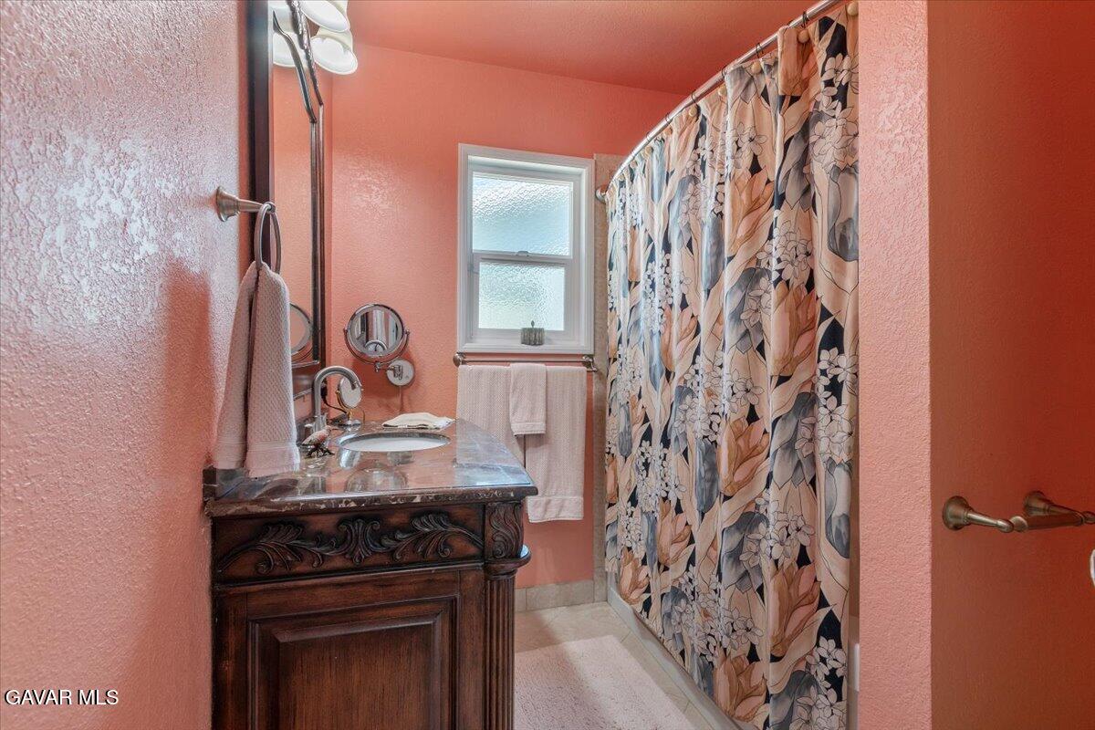 4817 Quartz Hill Road Quartz Hill, CA 93536 - Photo 15 of 41 a kitchen with a stove and a sink