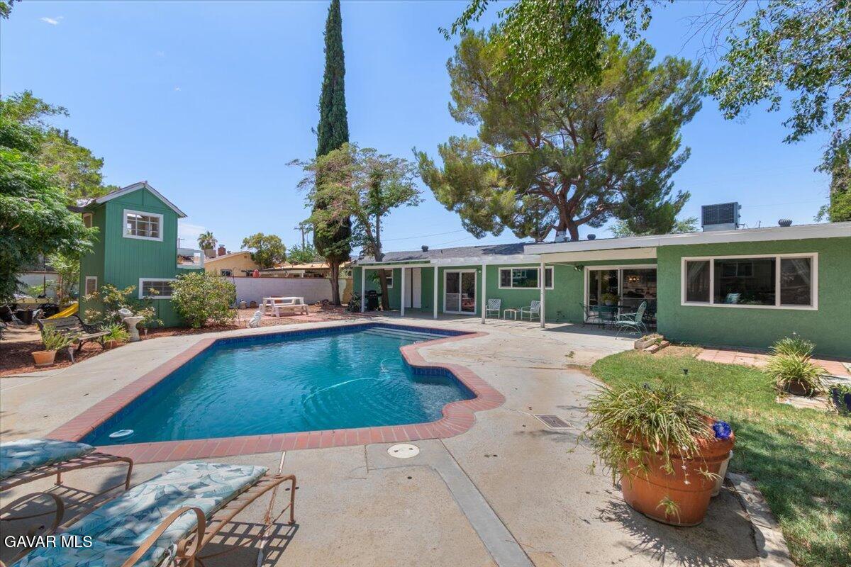4817 Quartz Hill Road Quartz Hill, CA 93536 - Photo 28 of 41 a view of a house with swimming pool