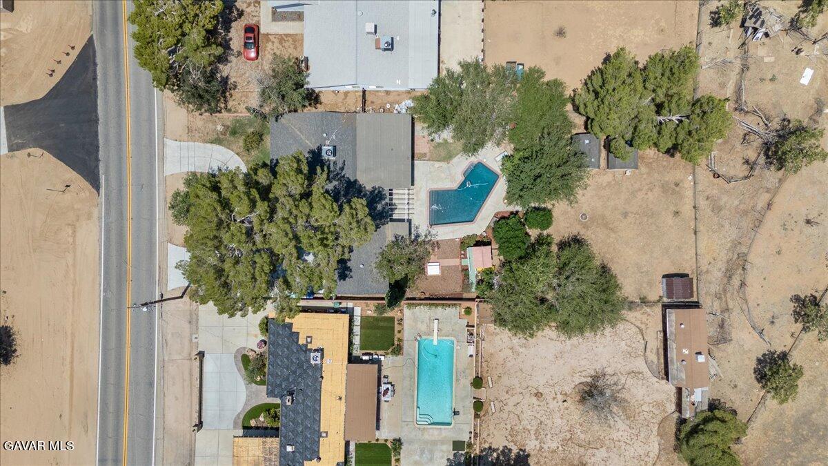 4817 Quartz Hill Road Quartz Hill, CA 93536 - Photo 35 of 41 an aerial view of a house with a yard