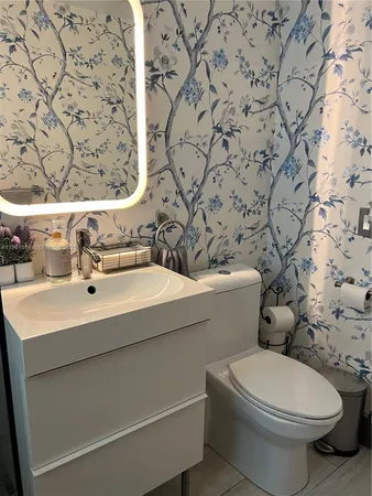 a bathroom with a sink and a toilet