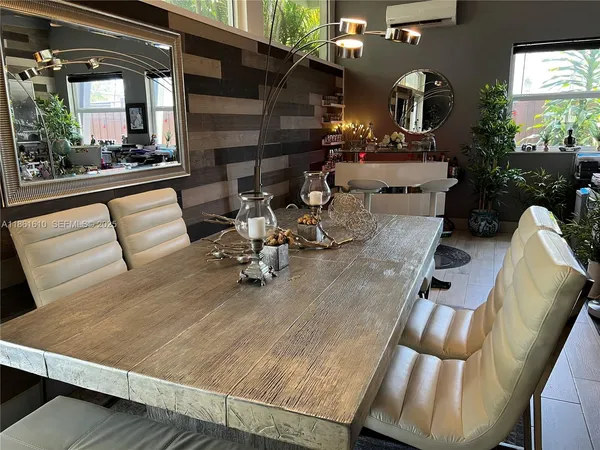 a view of a living room and dining room