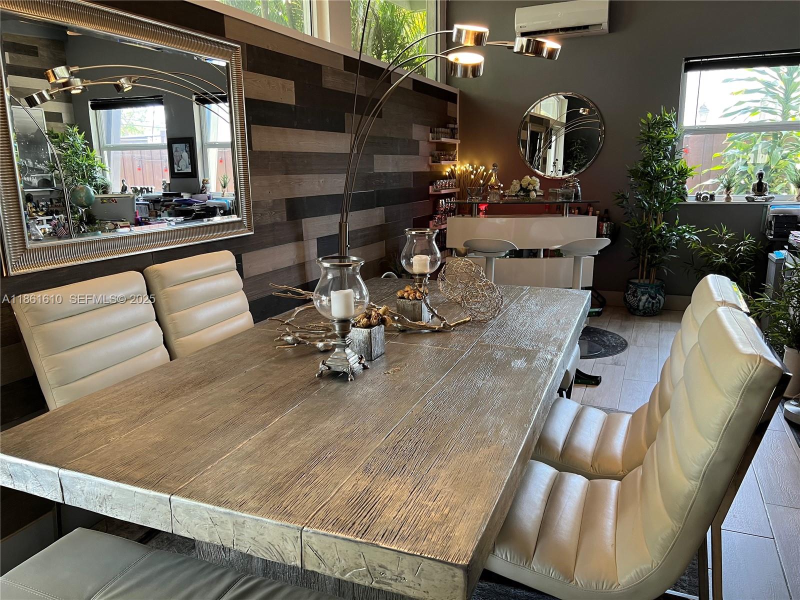 1900 Keystone Boulevard North Miami, FL 33181 - Photo 3 of 14 a view of a living room and dining room