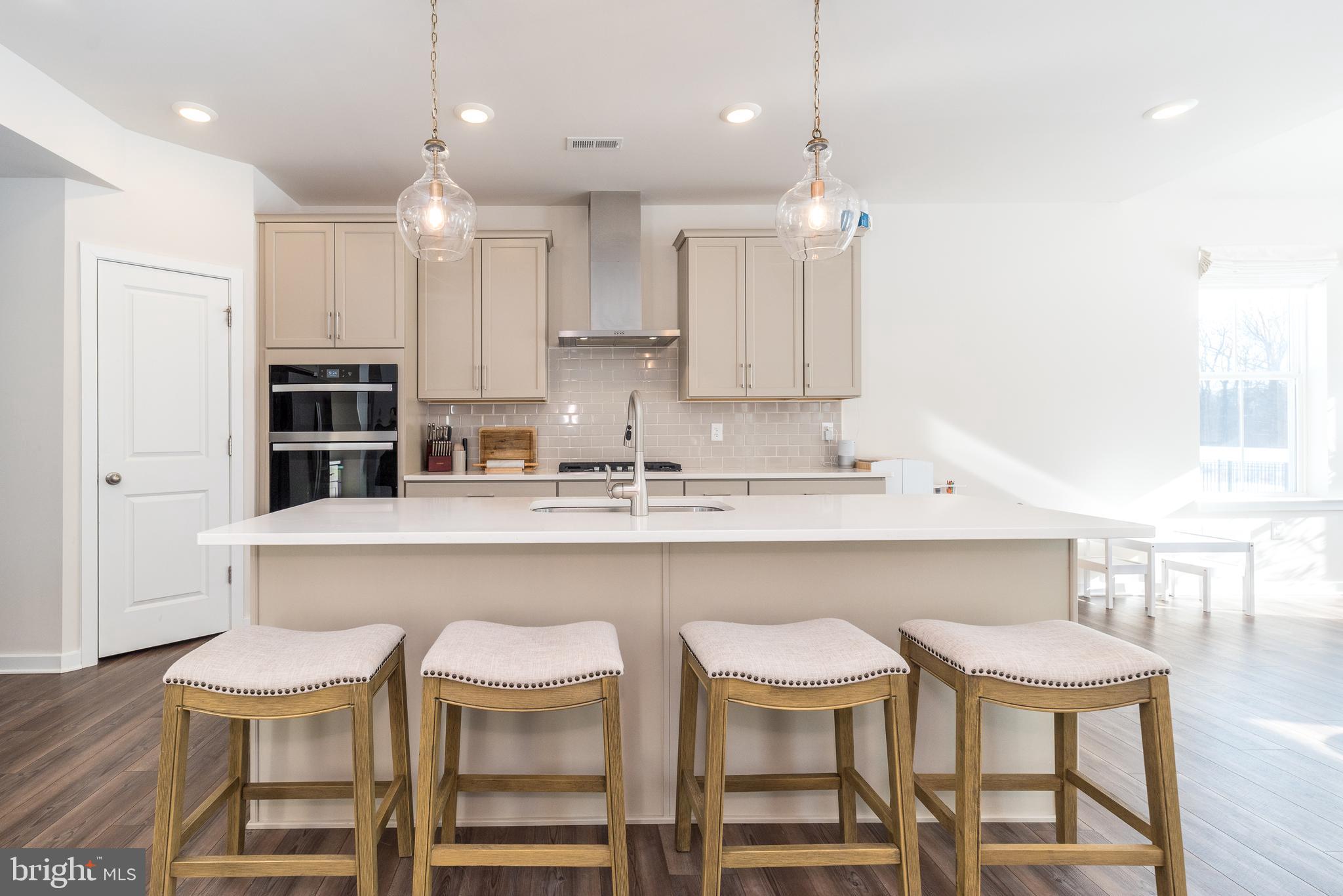 1033 Mariwill Drive Quakertown, PA 18951 - Photo 24 of 67 View of the kitchen from the family room