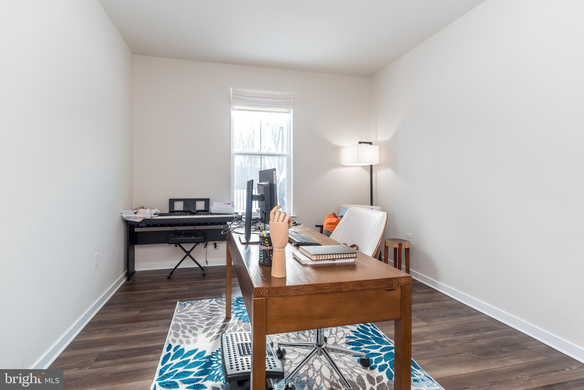 1033 Mariwill Drive Quakertown, PA 18951 - Photo 31 of 67 a workspace with furniture and wooden floor