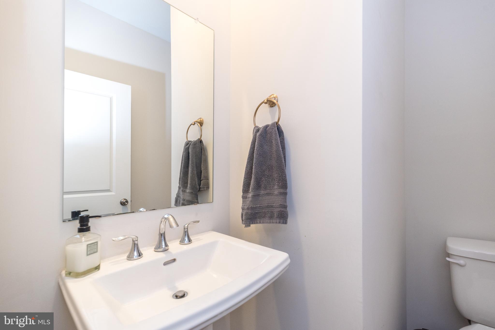 1033 Mariwill Drive Quakertown, PA 18951 - Photo 33 of 67 a bathroom with a sink and a mirror