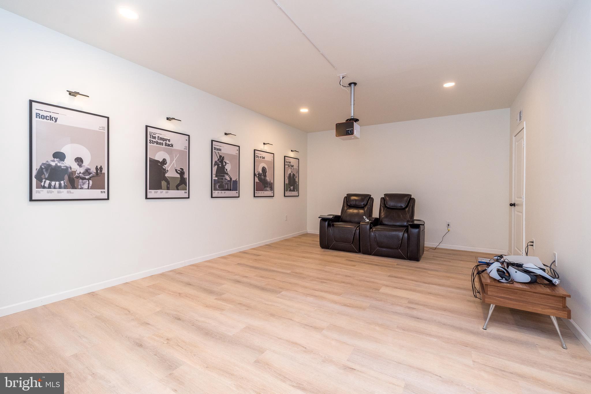 1033 Mariwill Drive Quakertown, PA 18951 - Photo 38 of 67 a living room with furniture and a flat screen tv