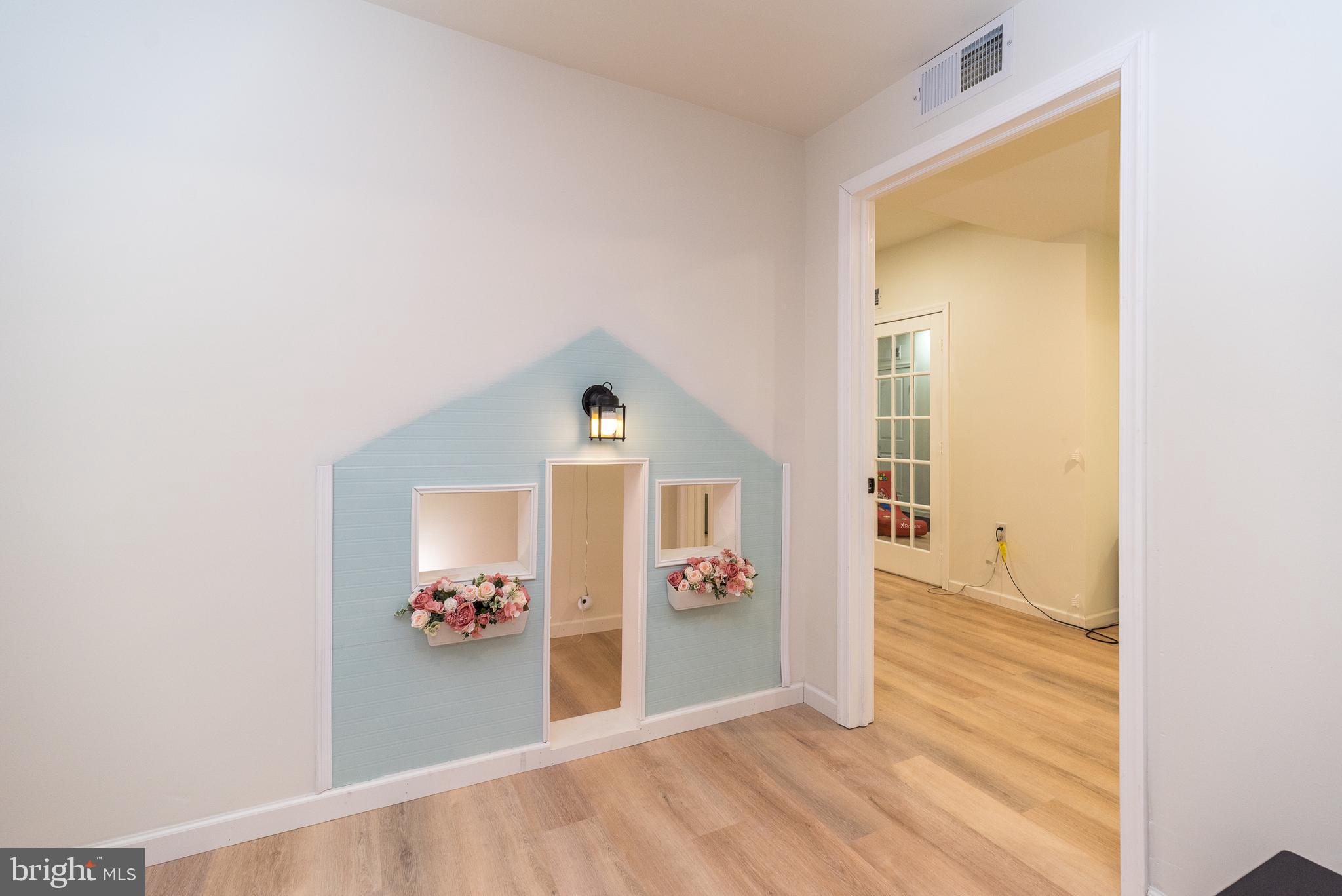 1033 Mariwill Drive Quakertown, PA 18951 - Photo 40 of 67 a view of a hallway view with wooden floor and front door