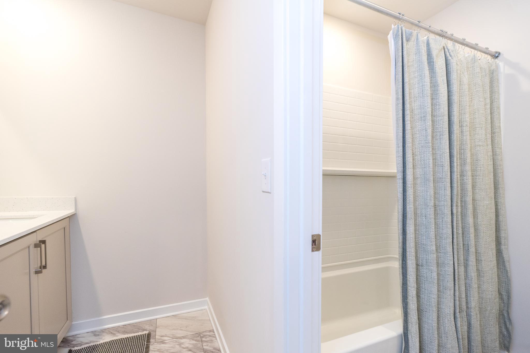 1033 Mariwill Drive Quakertown, PA 18951 - Photo 62 of 67 a bathroom with a shower and a tub