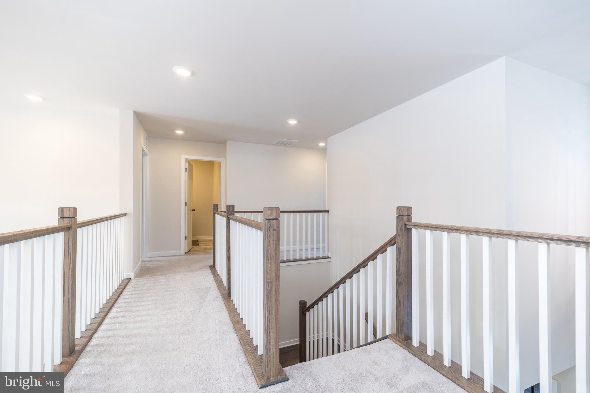 1033 Mariwill Drive Quakertown, PA 18951 - Photo 64 of 67 a view of a hallway with wooden floor