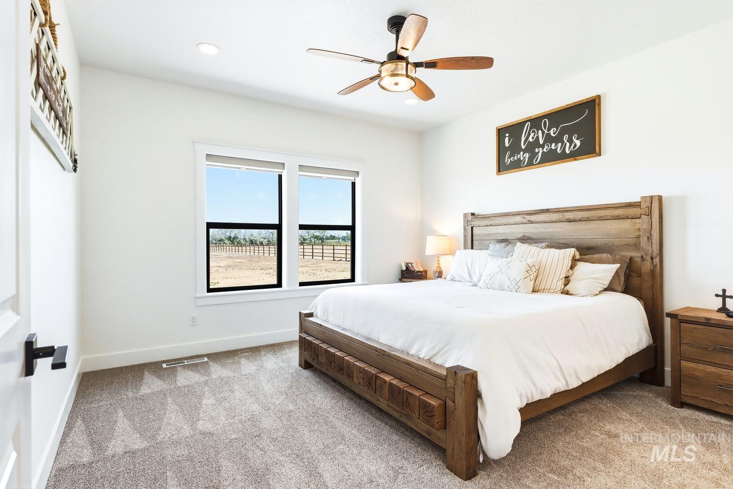 18658 Tranquil Place Caldwell, ID 83607 - Photo 20 of 44 Spacious room featuring neutral carpeting, recessed ceiling lighting, and a contemporary ceiling fan