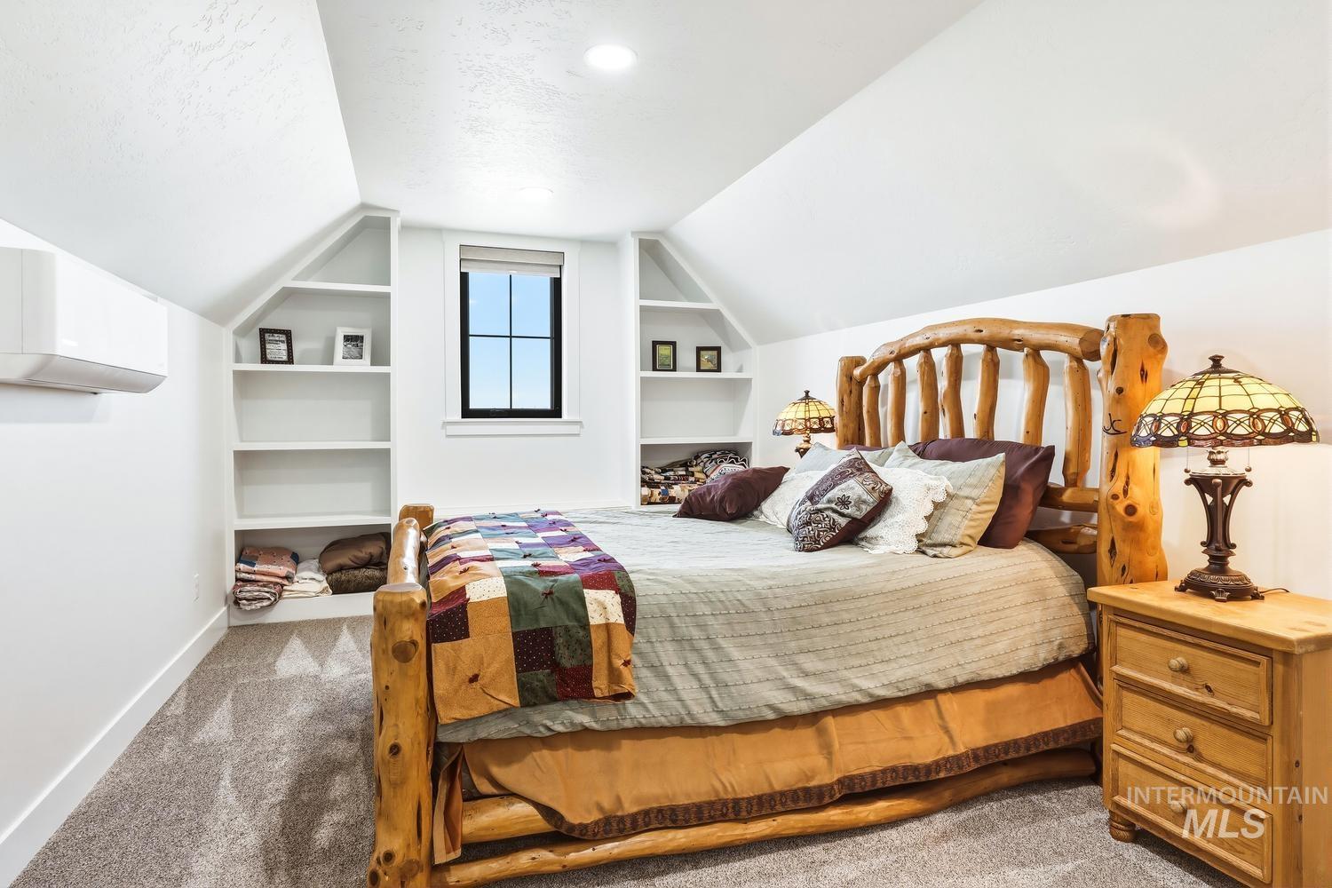 18658 Tranquil Place Caldwell, ID 83607 - Photo 35 of 44 Carpeted room with white walls and a sloped ceiling