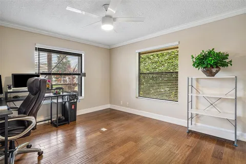 a bathroom with a toilet a sink and a mirror