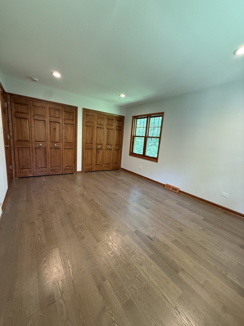 2841 Orange Brace Road Deerfield, IL 60015 - Photo 17 of 30 an empty room with windows