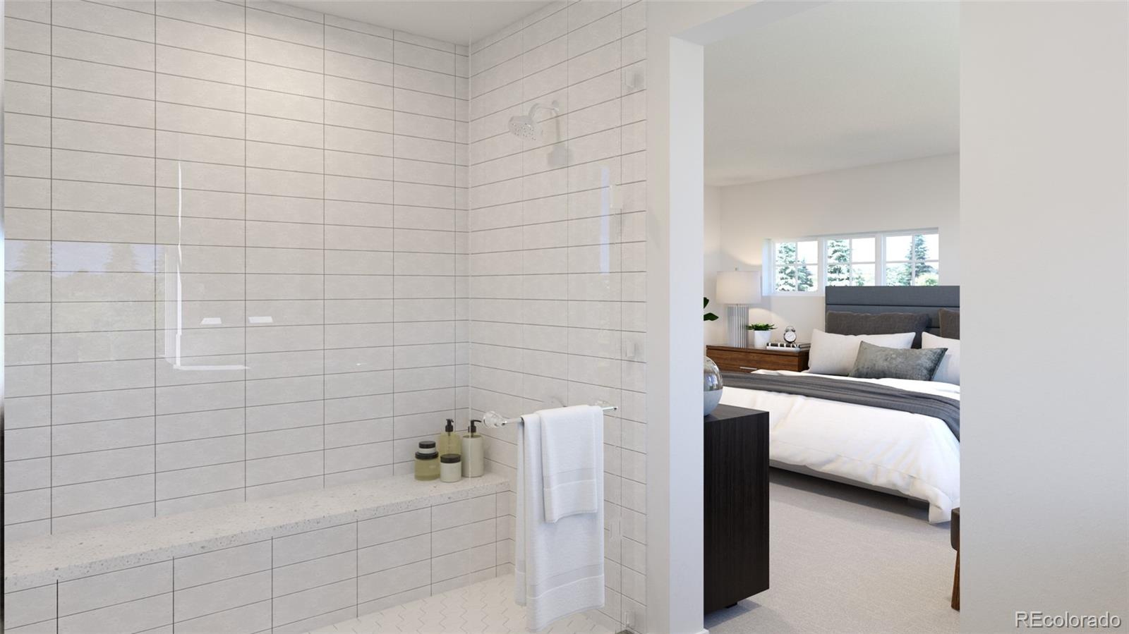 3853 Harmans Rdg Trail Evergreen, CO 80439 - Photo 13 of 14 a bathroom with a bathtub and a shower