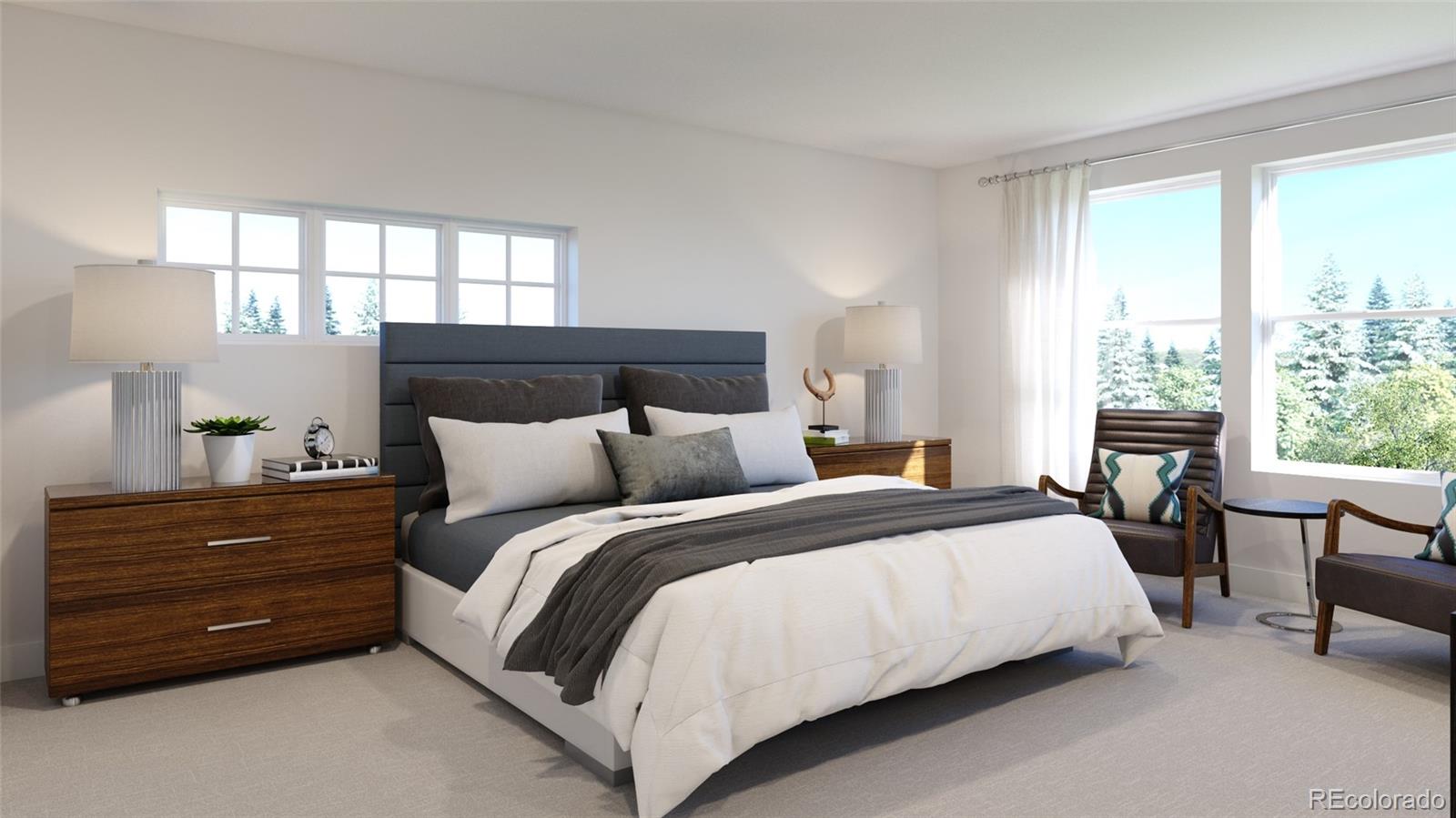 3853 Harmans Rdg Trail Evergreen, CO 80439 - Photo 9 of 14 a bed room with a bed and a chair