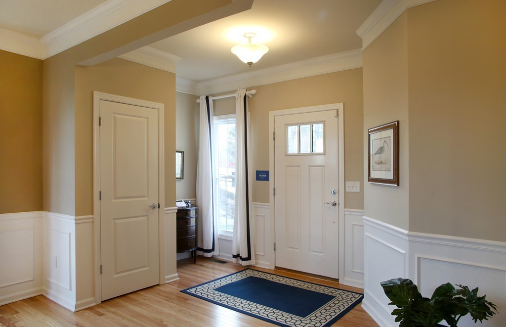 4 Locust Lane, Unit 49 Hopkinton, MA 01748 - Photo 4 of 17 a view of room with window and hardwood