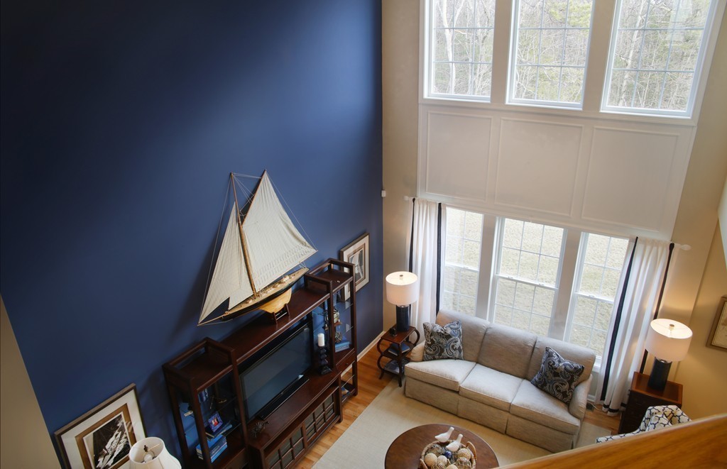 4 Locust Lane, Unit 49 Hopkinton, MA 01748 - Photo 5 of 17 a living room with furniture and a window