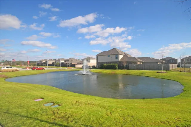 a view of a swimming pool with an ocean view