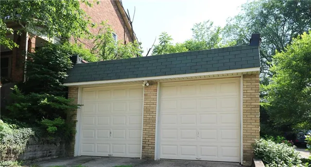 front view of a house and an window