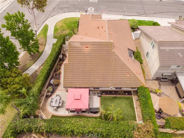 an aerial view of a house with swimming pool