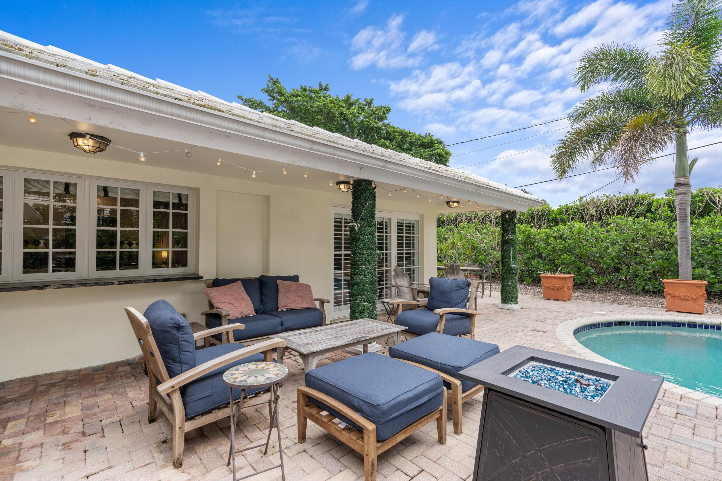 858 Hickory Terrace Boca Raton, FL 33486 - Photo 23 of 43 a outdoor living space with furniture and garden