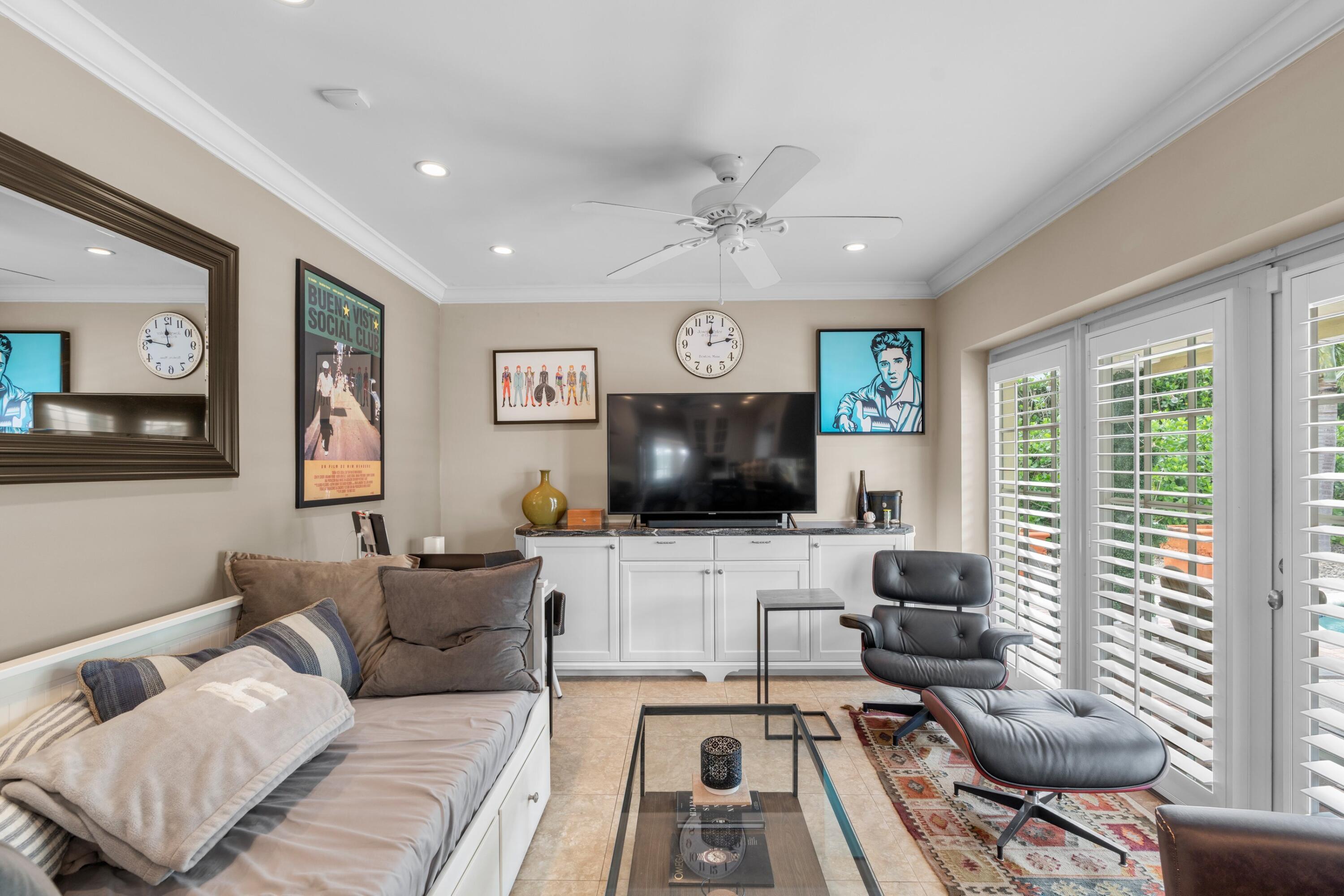 858 Hickory Terrace Boca Raton, FL 33486 - Photo 8 of 43 a living room with furniture and a flat screen tv