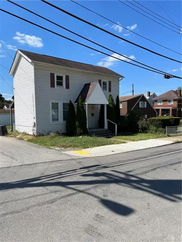 a view of a house with a terrace