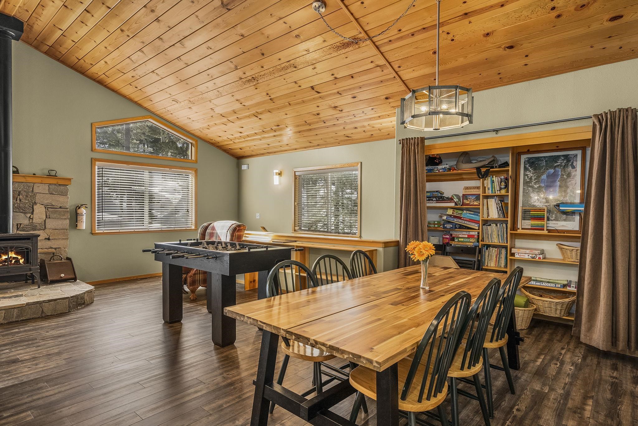 15591 Conifer Drive Truckee, CA 96161 - Photo 15 of 28 a view of a dining room with furniture window and wooden floor