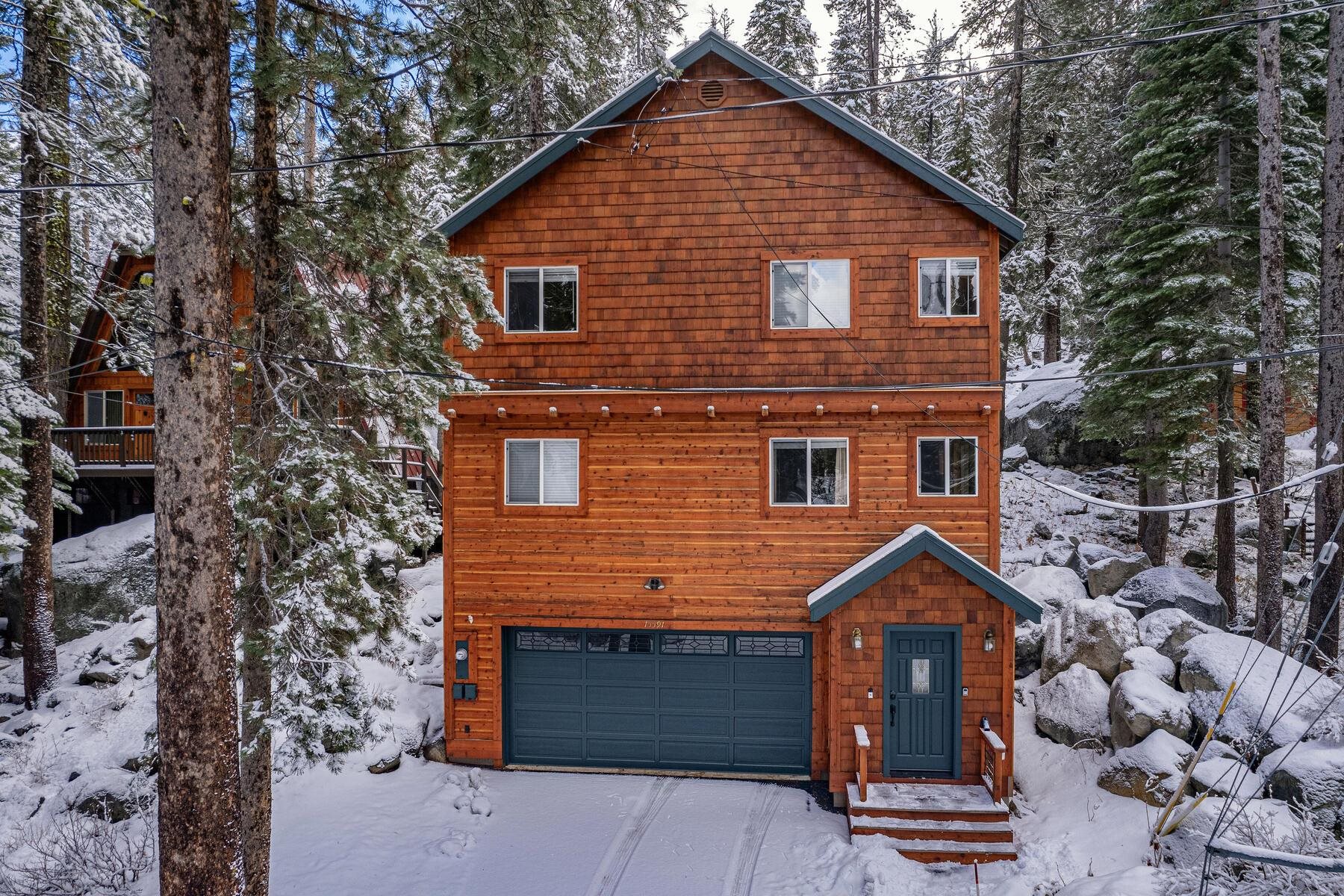 15591 Conifer Drive Truckee, CA 96161 - Photo 2 of 28 a front view of a house with a yard