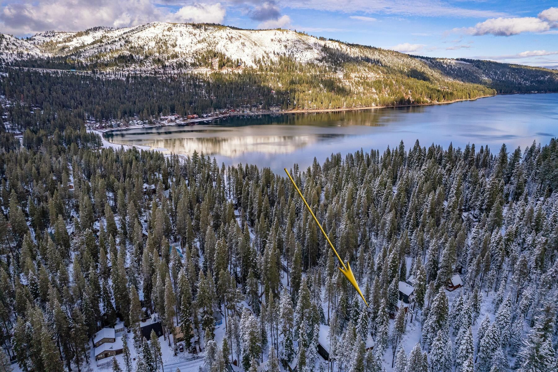 15591 Conifer Drive Truckee, CA 96161 - Photo 3 of 28 a view of a lake with houses in the back