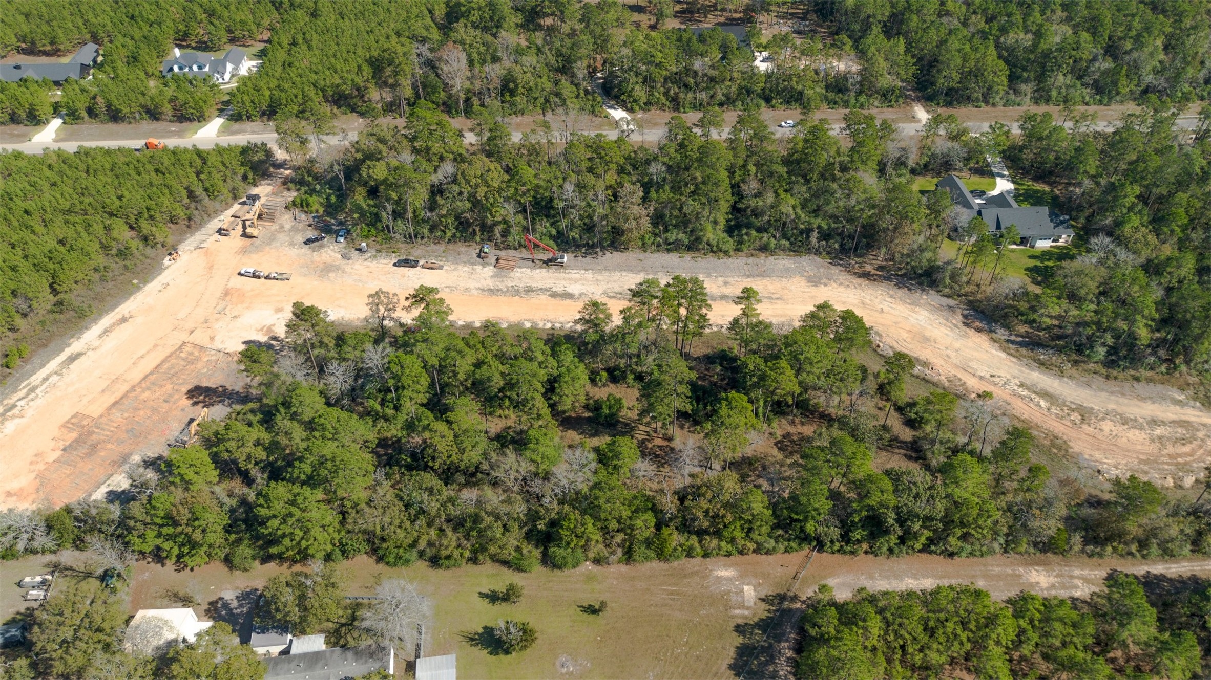 15645 Ridge Rock Road Willis, TX 77378 - Photo 12 of 15 a view of a yard with a tree