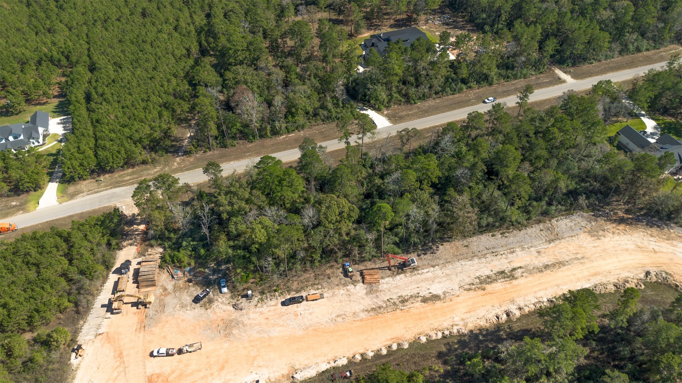 15645 Ridge Rock Road Willis, TX 77378 - Photo 13 of 15 a view of a yard covered with snow in outdoor space