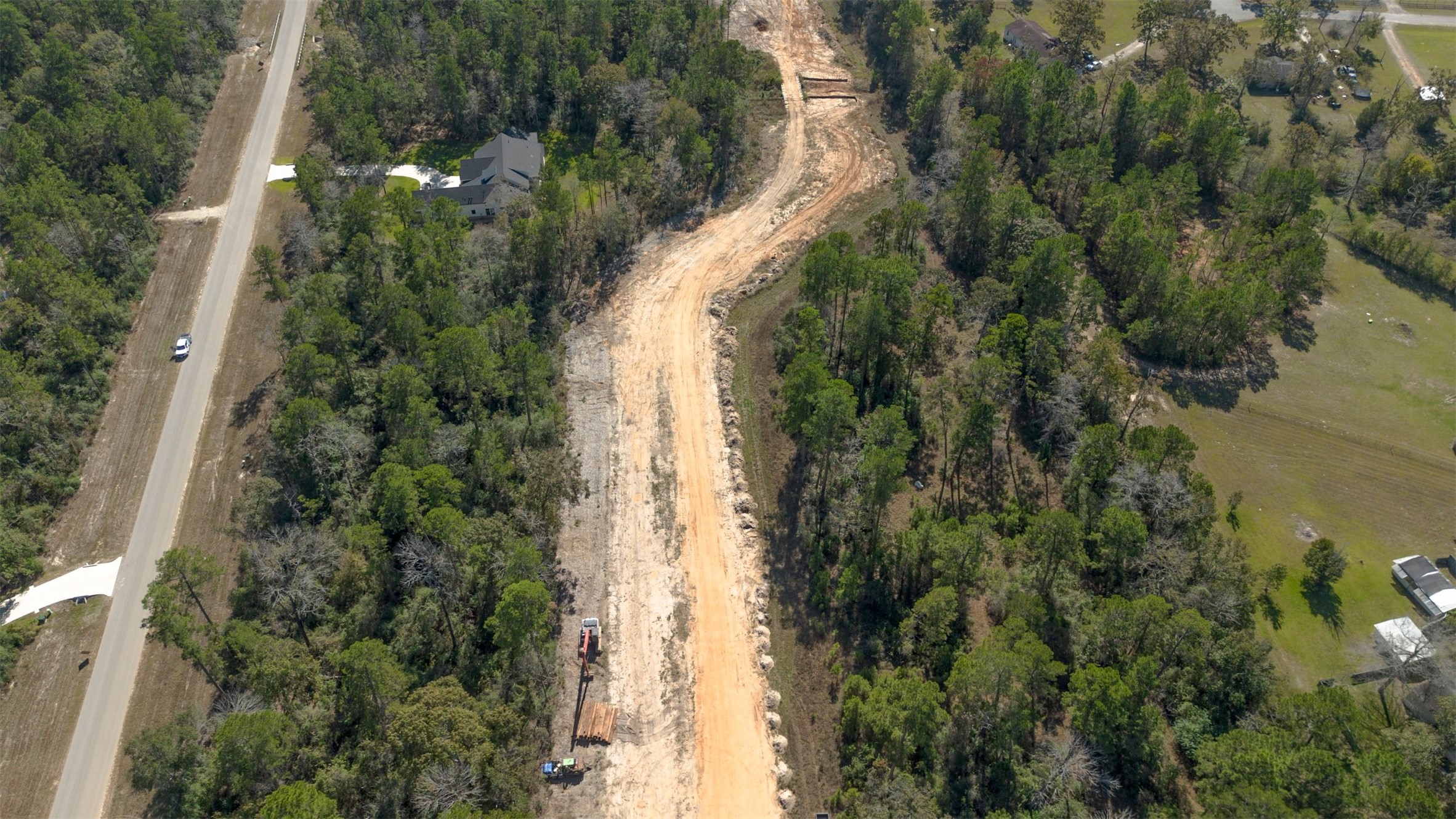 15645 Ridge Rock Road Willis, TX 77378 - Photo 14 of 15 an aerial view of residential houses with outdoor space and trees