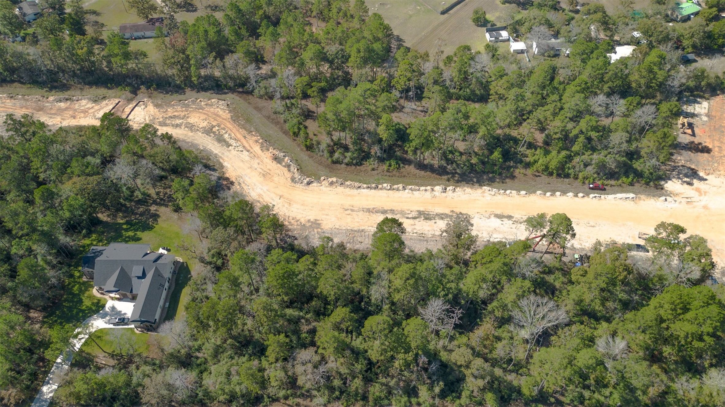 15645 Ridge Rock Road Willis, TX 77378 - Photo 15 of 15 an aerial view of a houses with yard