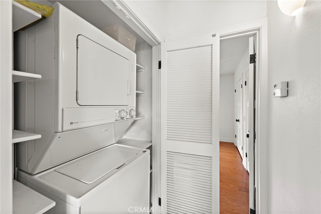 146 Cliff Drive, Unit C Laguna Beach, CA 92651 - Photo 20 of 21 a bathroom with a bathtub and a shower