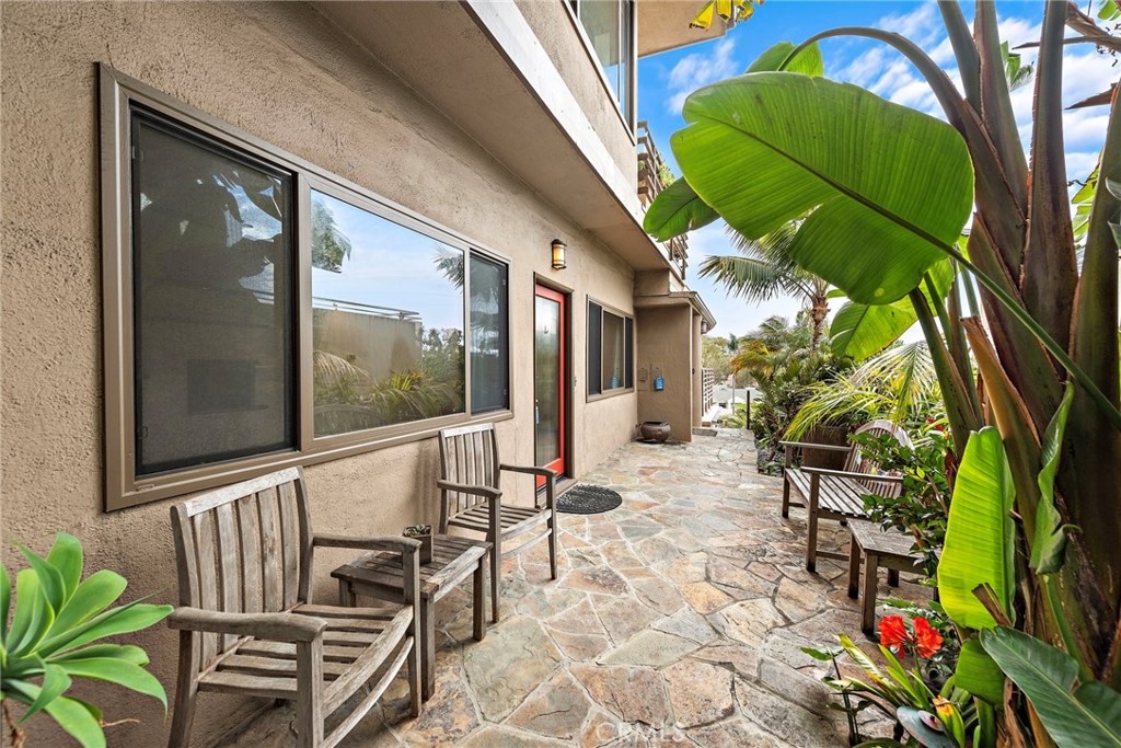146 Cliff Drive, Unit C Laguna Beach, CA 92651 - Photo 3 of 21 a view of a chairs and table in the balcony