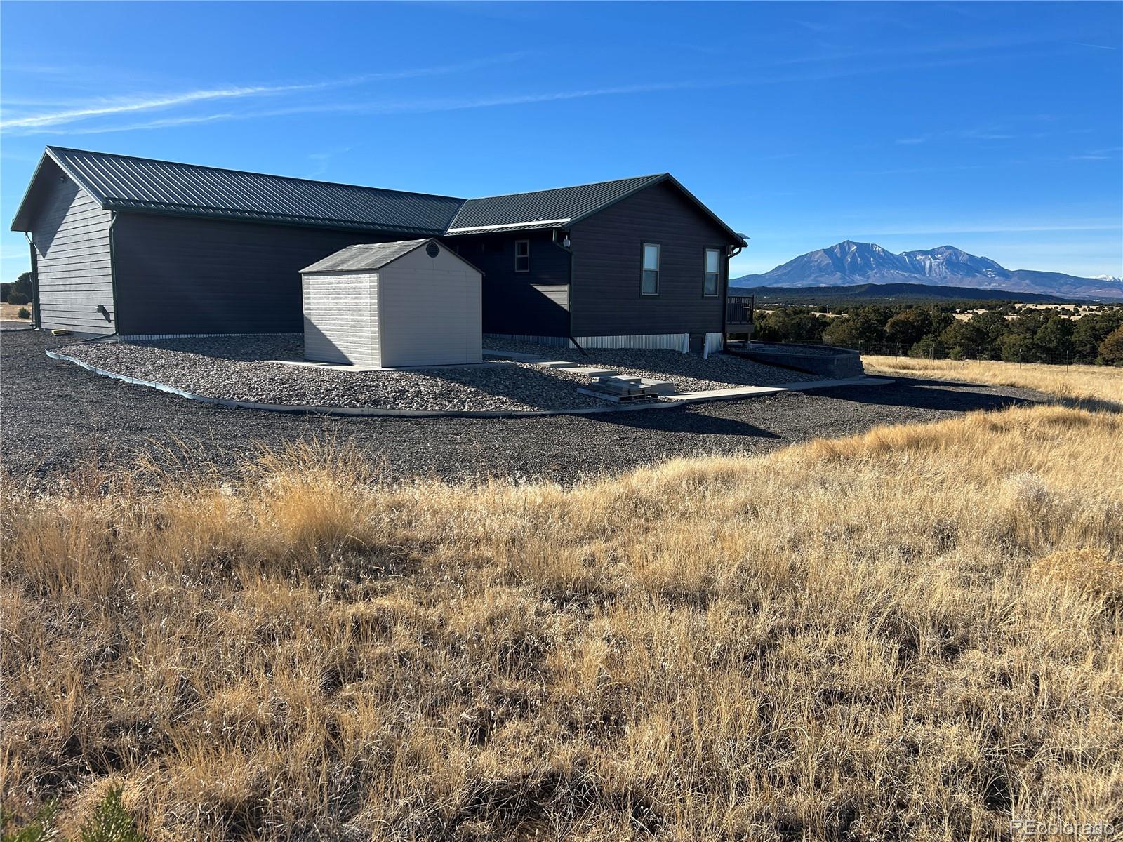 517 Trailsend Road Walsenburg, CO 81089 - Photo 14 of 33 a front view of a house with yard
