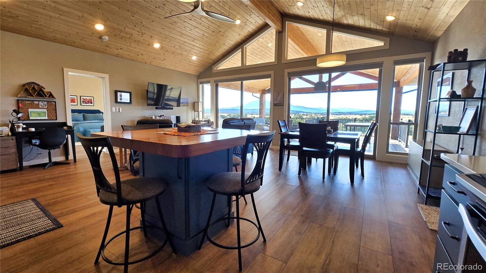 517 Trailsend Road Walsenburg, CO 81089 - Photo 22 of 33 a dining room with furniture window and wooden floor