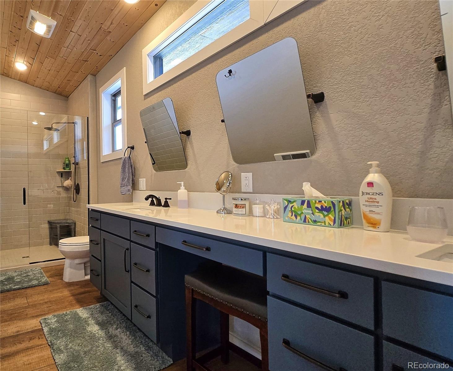 517 Trailsend Road Walsenburg, CO 81089 - Photo 28 of 33 a bathroom with a double vanity sink mirror and toilet