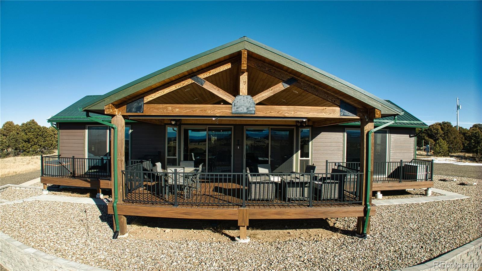 517 Trailsend Road Walsenburg, CO 81089 - Photo 4 of 33 a patio with a table and chairs