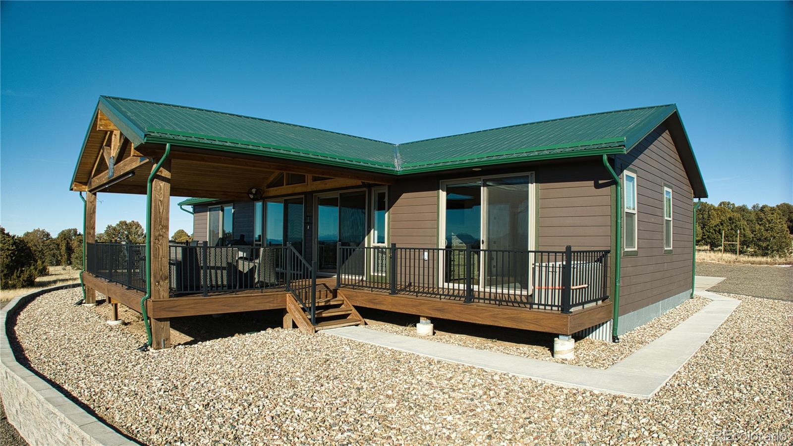 517 Trailsend Road Walsenburg, CO 81089 - Photo 7 of 33 a view of a house with a wooden floor and a yard
