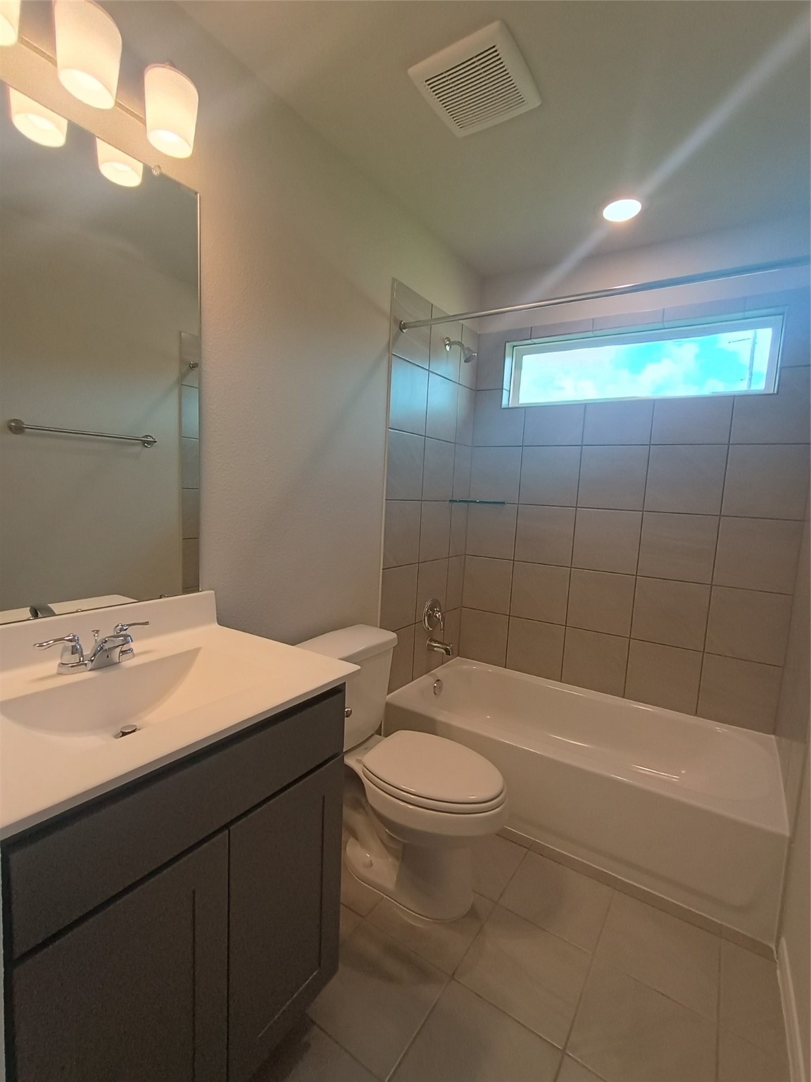26414 Cooperstown Way Splendora, TX 77372 - Photo 13 of 23 a bathroom with a sink a toilet and shower