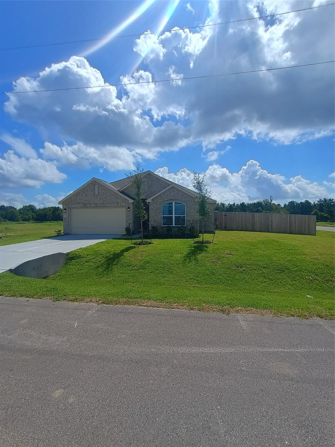26414 Cooperstown Way Splendora, TX 77372 - Photo 2 of 23 a view of an ocean and a yard